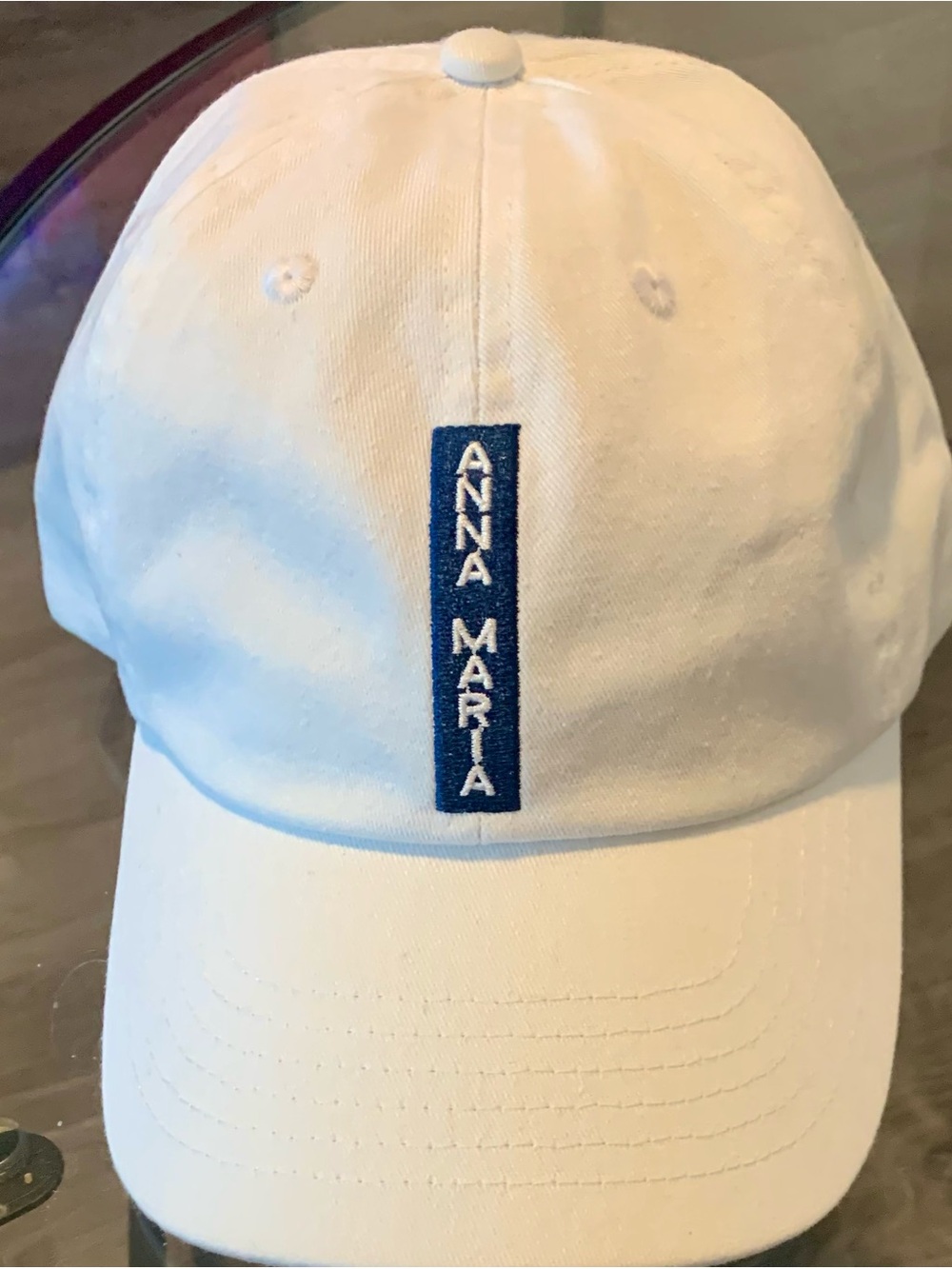 Anna Maria White Baseball Cap with Blue Vertical Logo